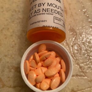 B705 pill Xanax 0,5 mg Orange oval